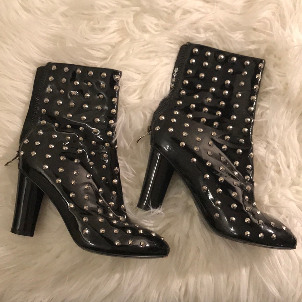 Black shiny leather studded heel boots